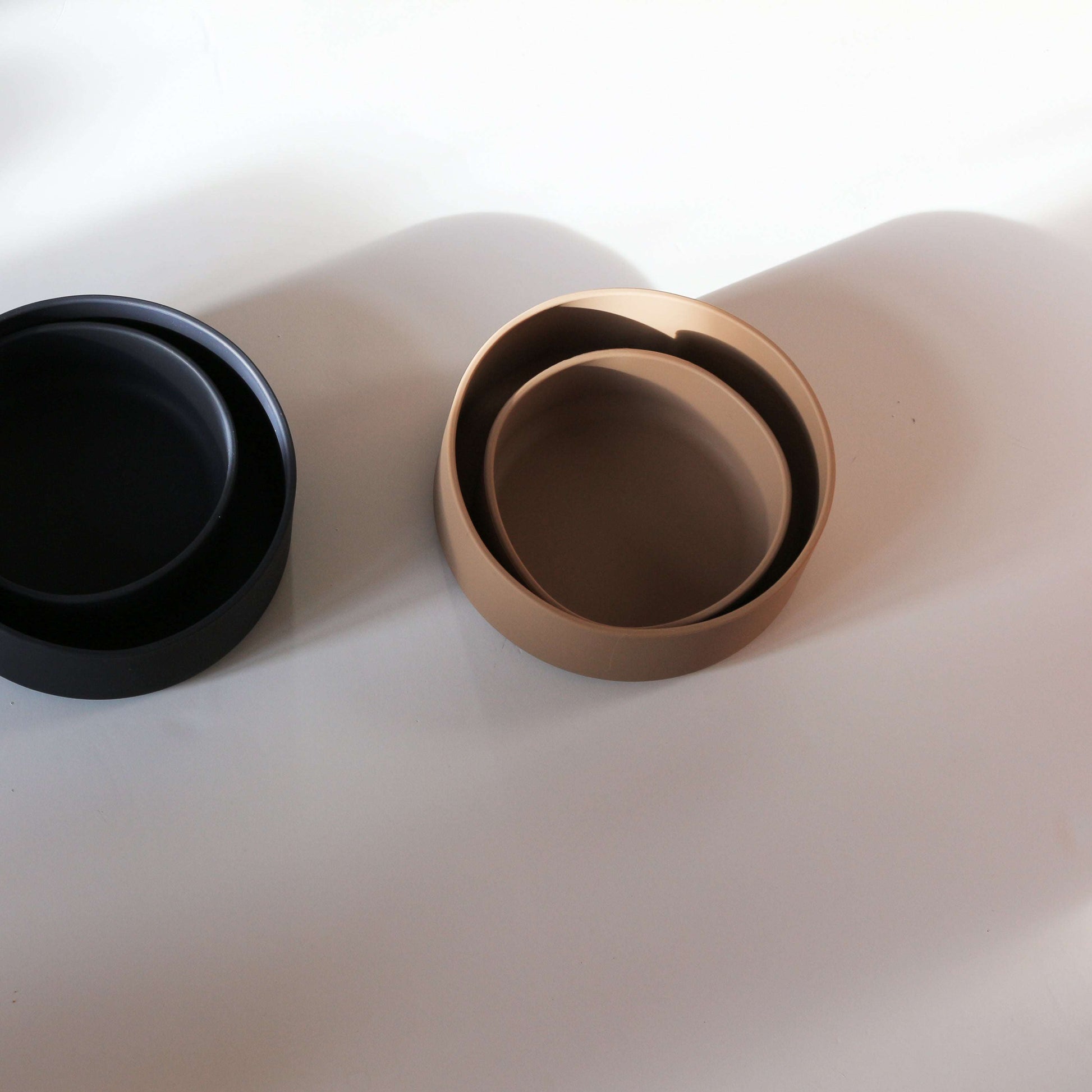 Top view of Tadazhi dark grey silicone pet food bowl, showcasing two sizes