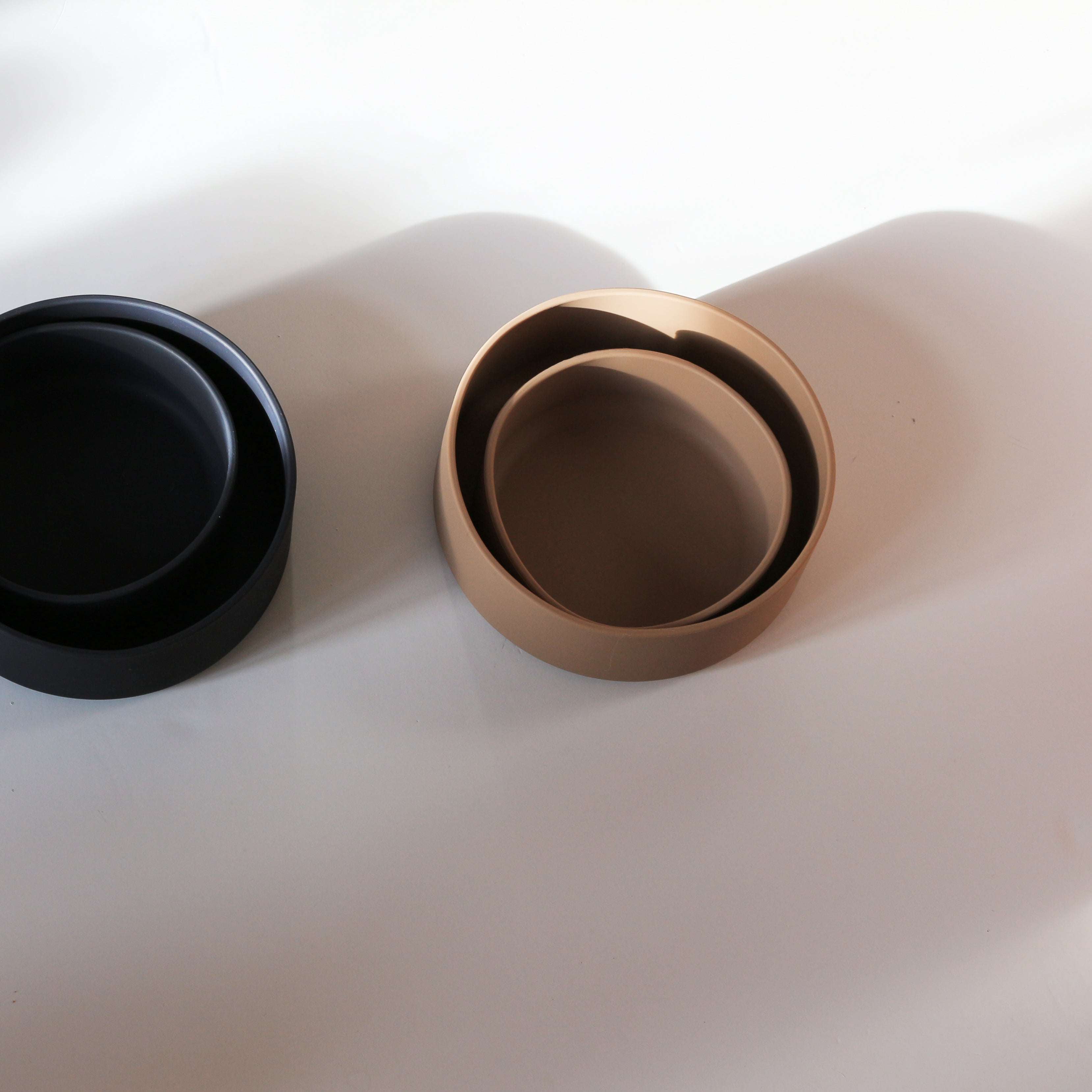 Top view of Tadazhi dark grey silicone pet food bowl, showcasing two sizes