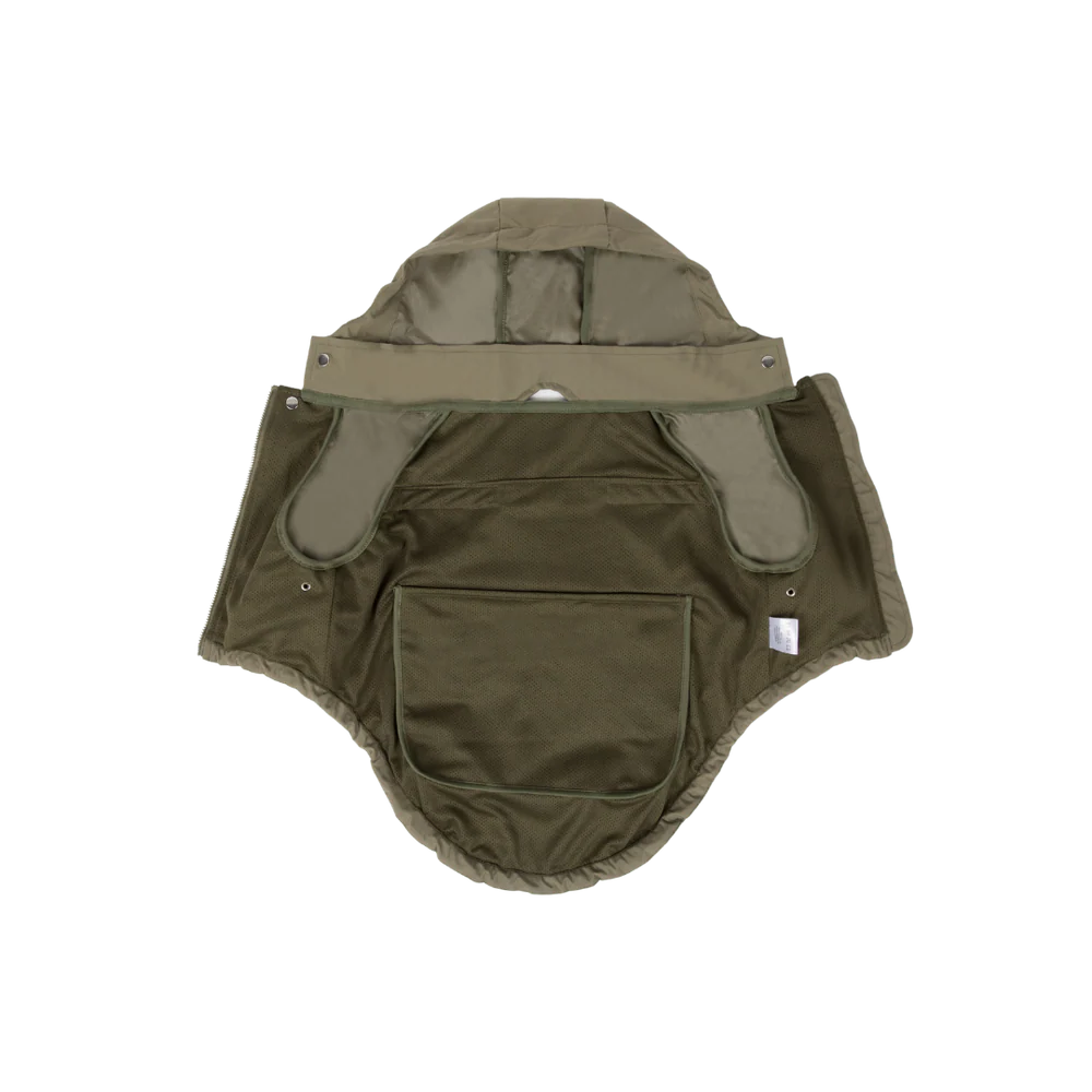 flat lay of Lambwolf Collective waterproof dog raincoats in sage green, functional and stylish outerwear