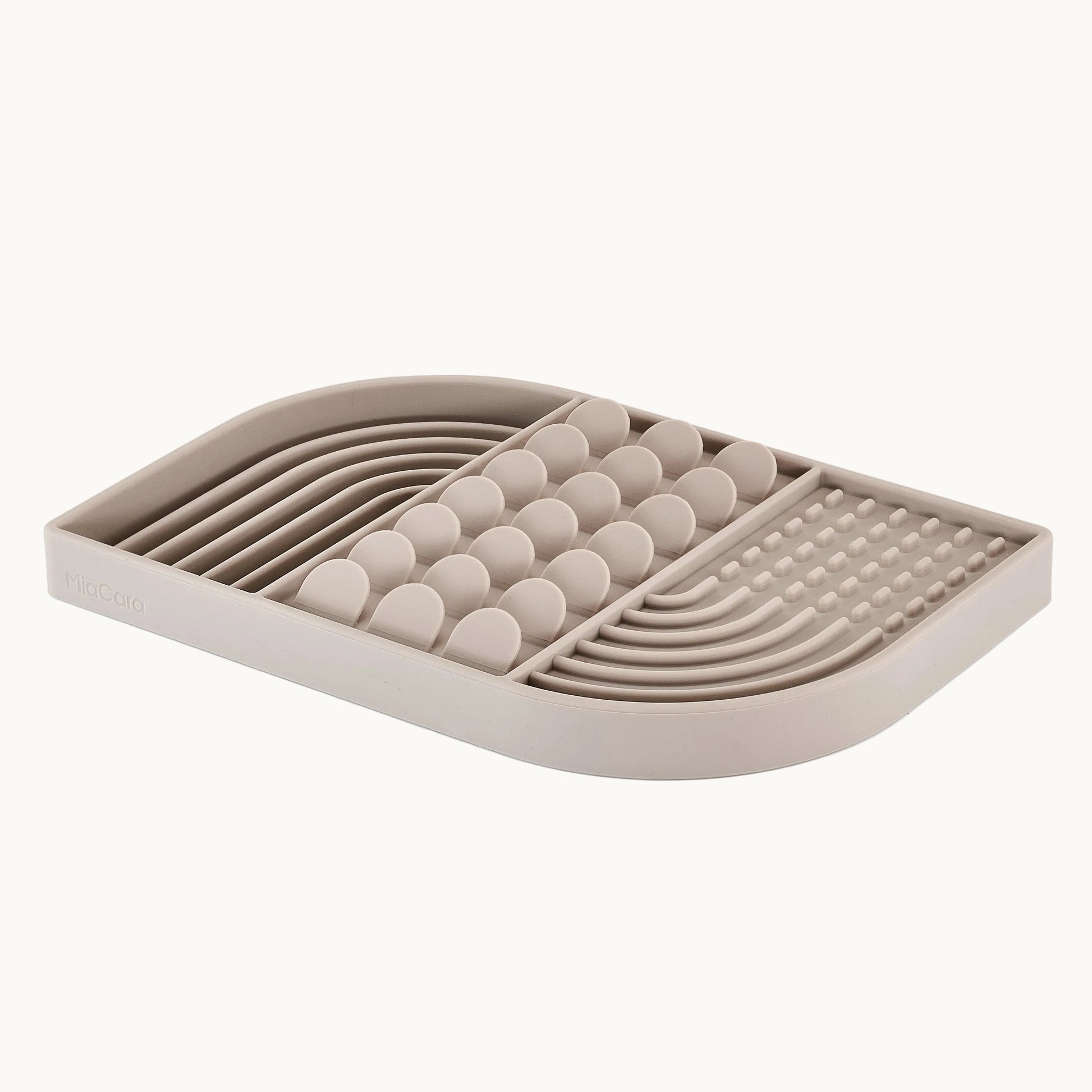 MiaCara Aperitivo interactive slow feeder toy in taupe, made from food-grade materials with textured grooves for engaging enrichment play.