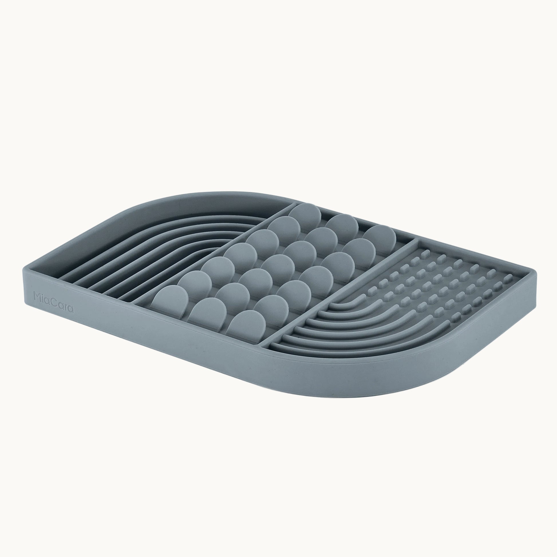MiaCara Aperitivo interactive slow feeder toy in grey blue, made from food-grade materials with textured grooves for engaging enrichment play.