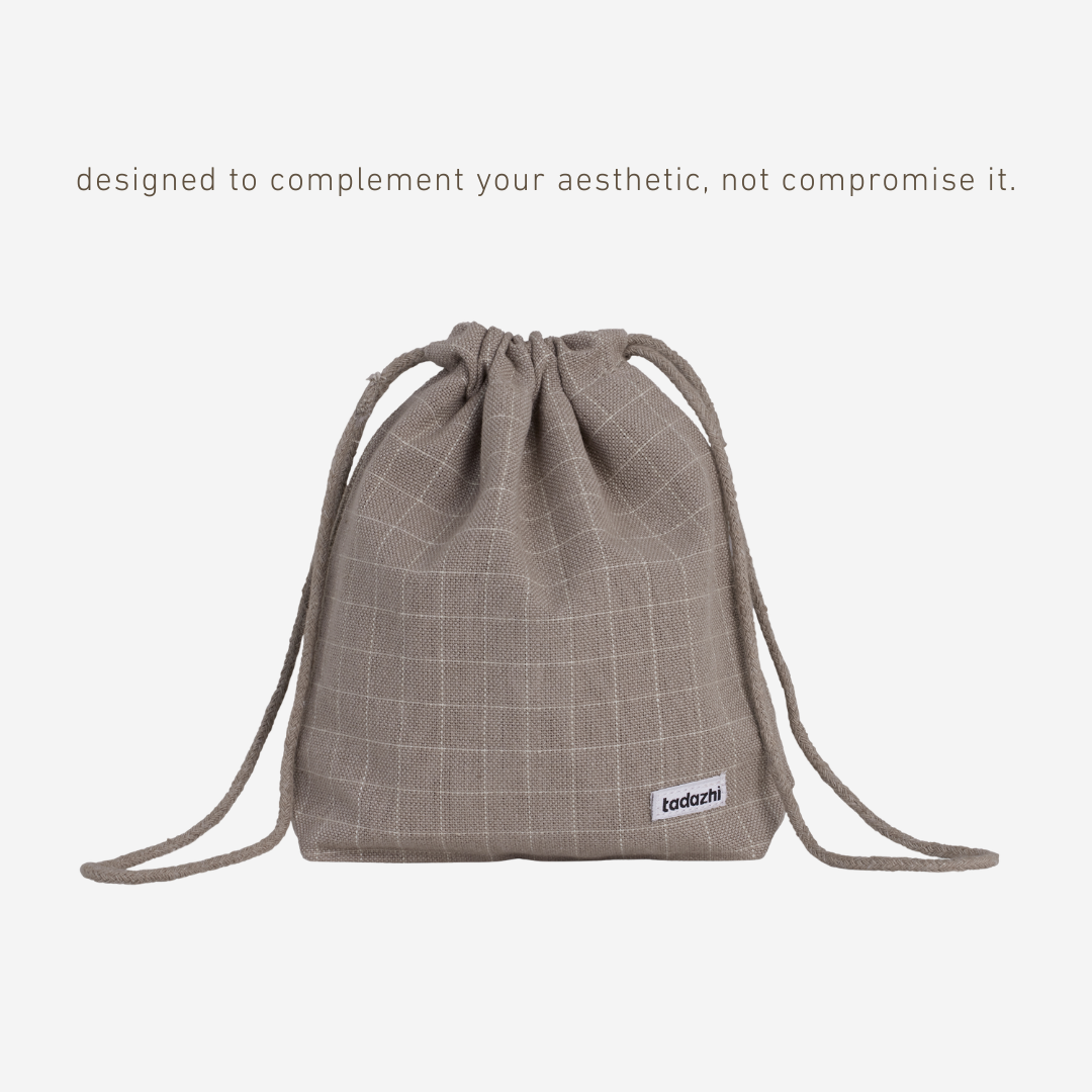 Drawstring bag with grid pattern on a white background