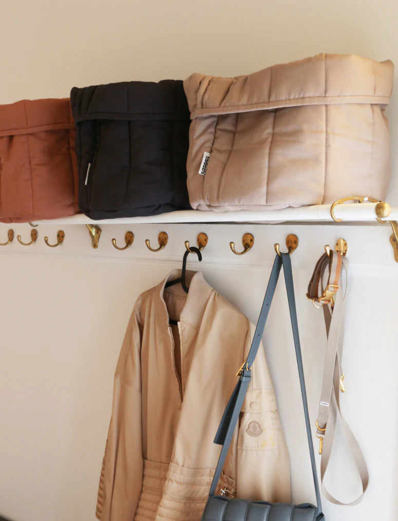 Scandanavian style pet storage basket from Tadazhi display on a wall rack