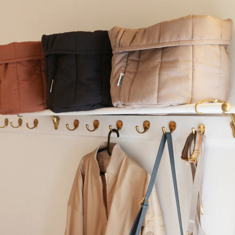 Scandanavian style pet storage basket from Tadazhi display on a wall rack