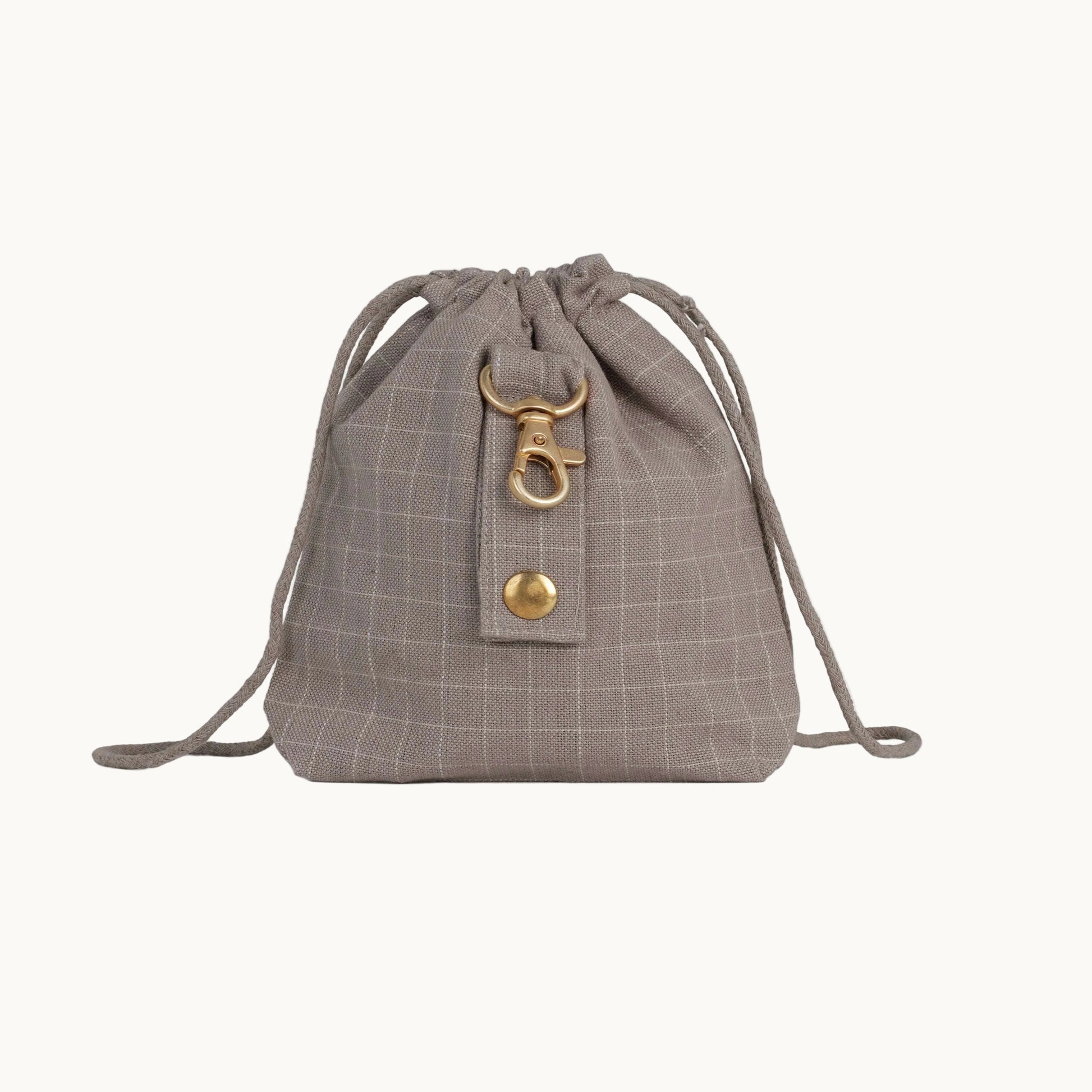 Chequered dark sand dog treat bag by Tadazhi, back view showing back buckle and drawstring straps.