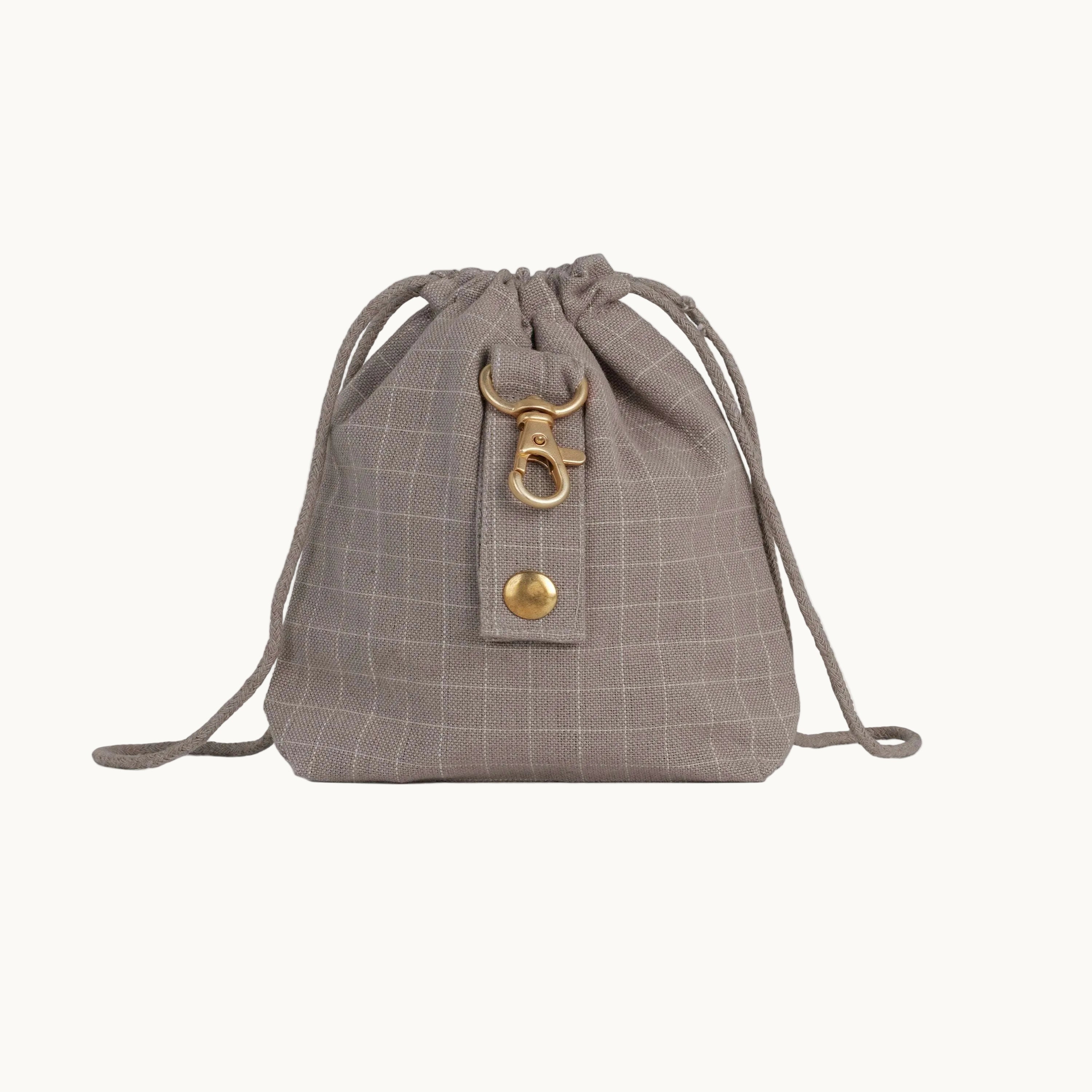 Chequered dark sand dog treat bag by Tadazhi, back view showing back buckle and drawstring straps.