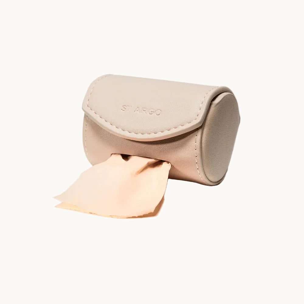 Minimalist beige vegan leather poop bag holder with stitched flap and embossed ST ARGO logo, functional accessory from Lumi Pets Walk collection