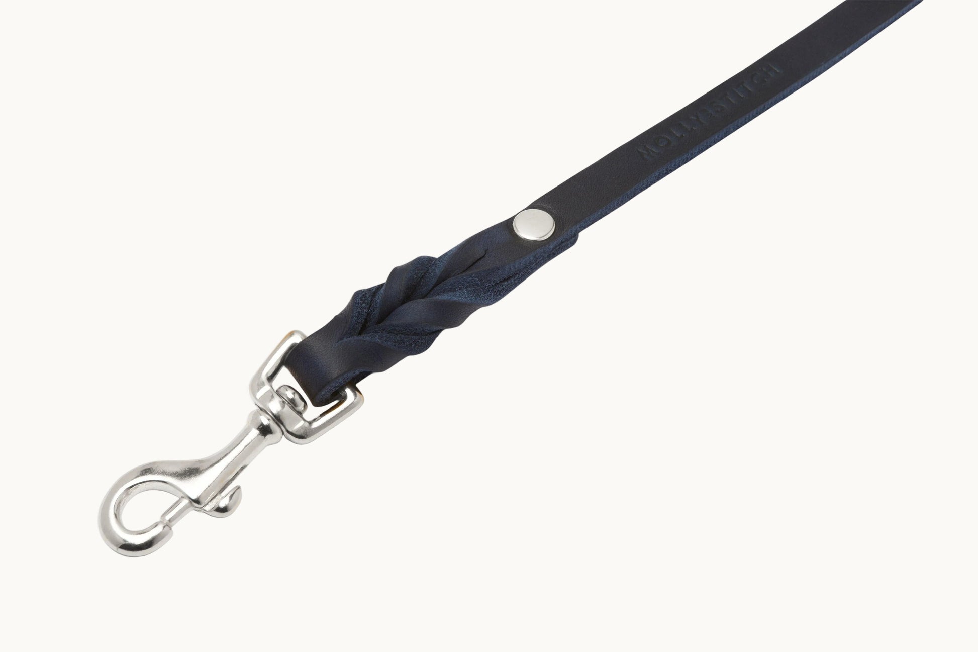 Close-up of Molly & Stitch blue butter leather leash, highlighting braided detail and polished silverclasp