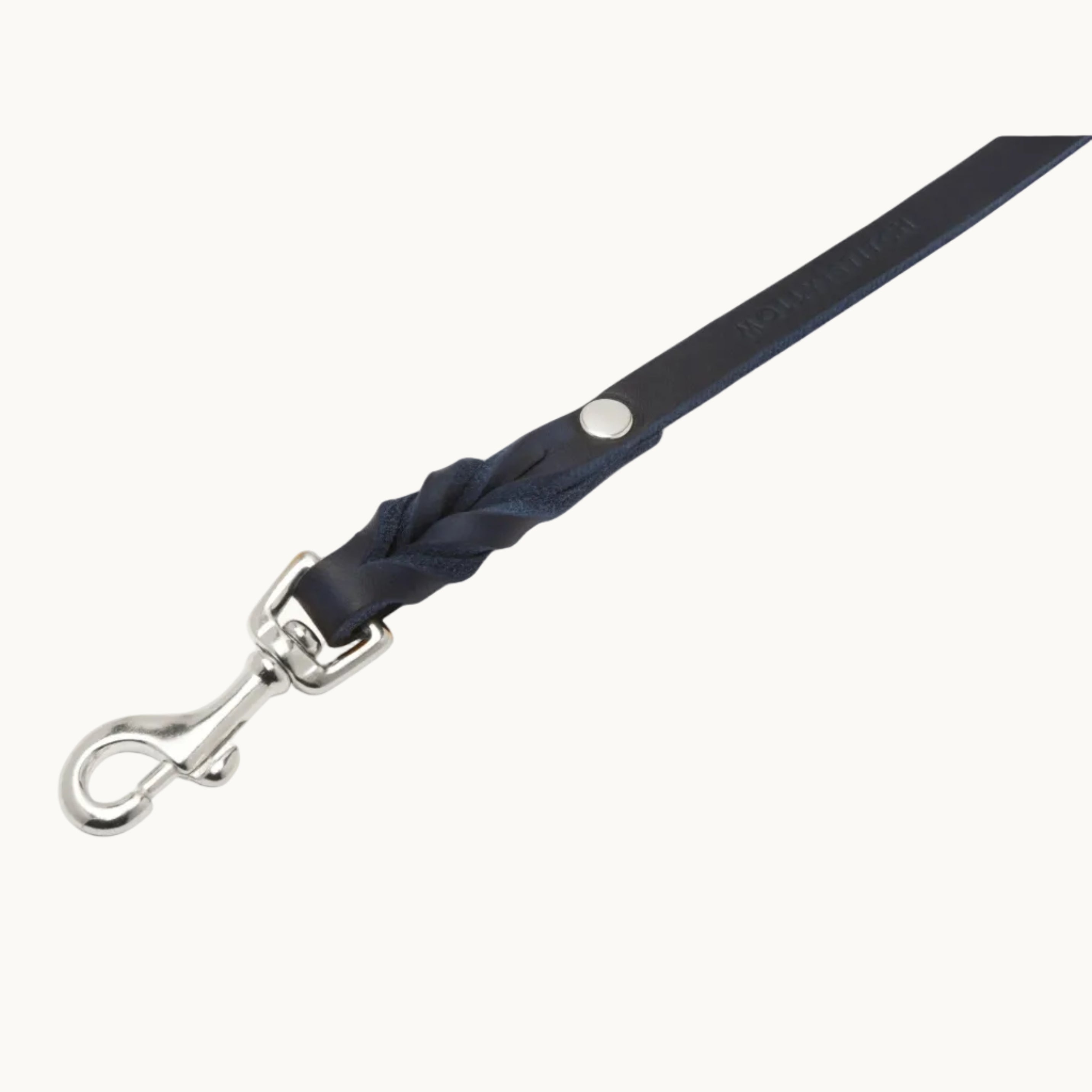 Close-up of Molly & Stitch blue butter leather leash, highlighting braided detail and polished silverclasp
