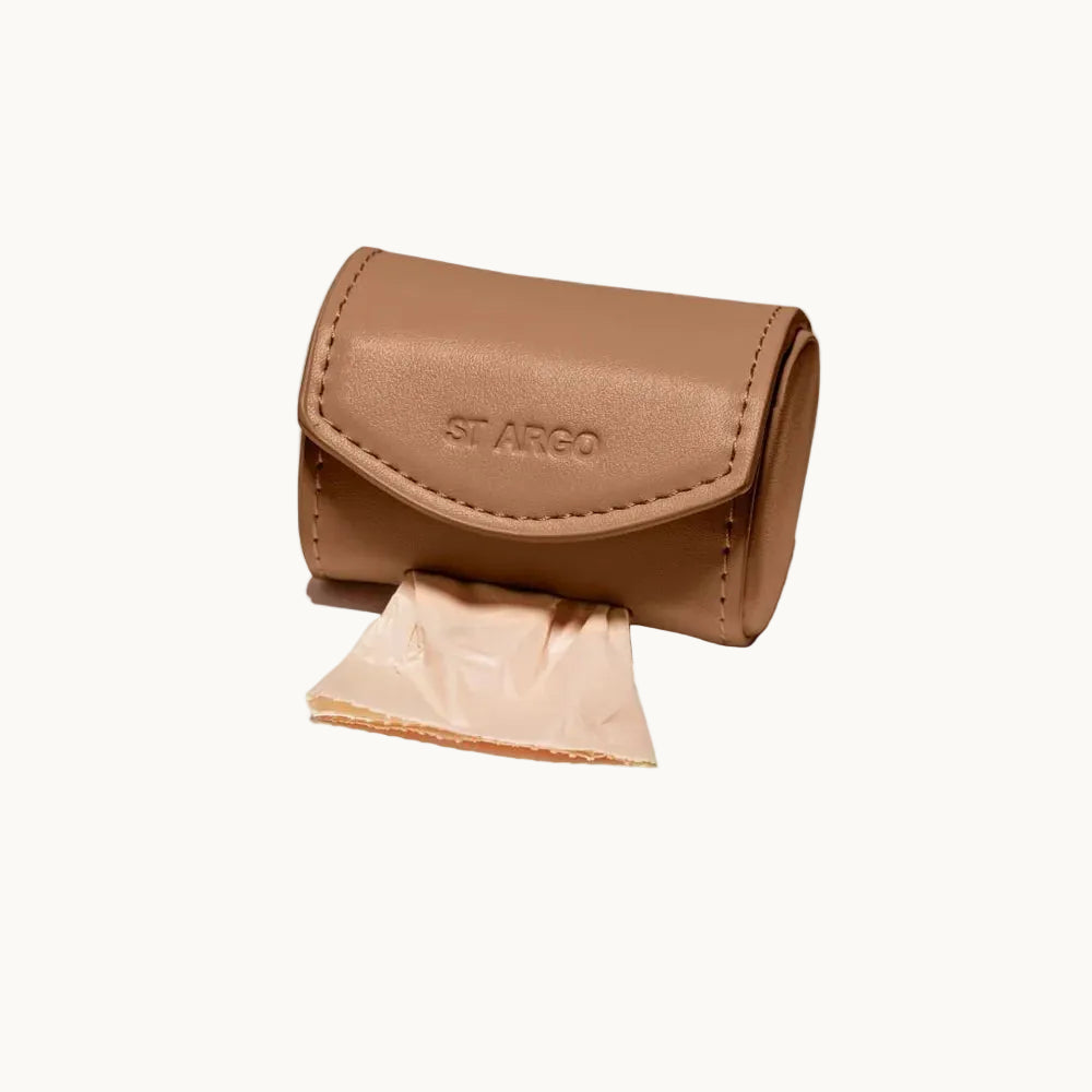 Minimalist brown vegan leather poop bag holder with stitched flap and embossed ST ARGO logo, functional accessory from Lumi Pets Walk collection