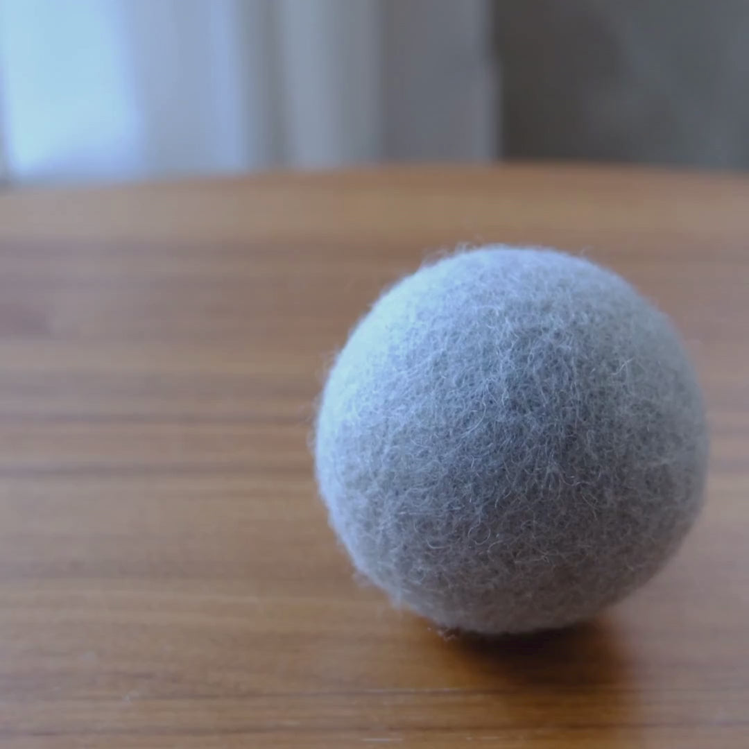 Load video: Natural Felt Wool Dog Toy Ball