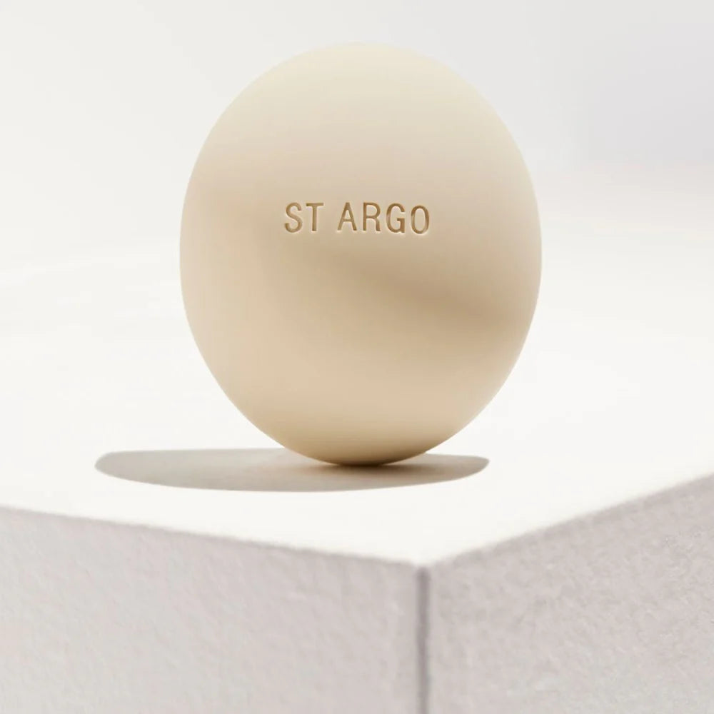 Minimalist beige ST ARGO silicone treat pouch, made from food-grade BPA-free material, odor-resistant and dishwasher safe.