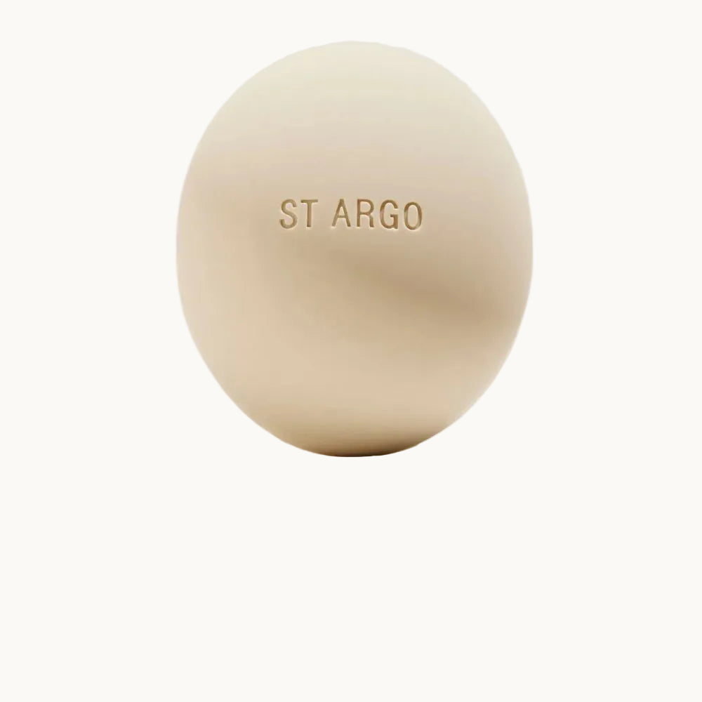 Minimalist beige ST ARGO silicone treat pouch, made from food-grade BPA-free material, odor-resistant and dishwasher safe.